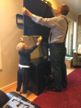 Helping Dad and Pop hang their new television